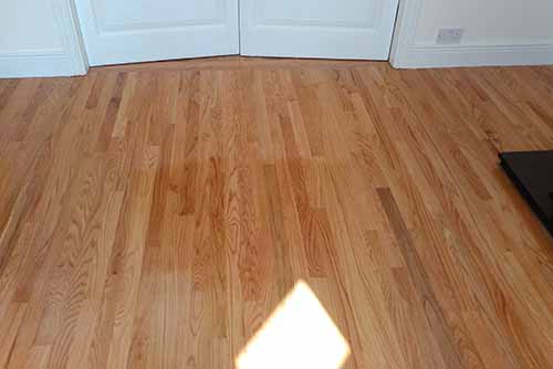 Red oak wood floor fitted in dining room - wood flooring product