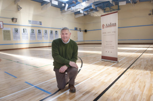 Company proprietor Tom Stanton standing on newly refurbished hardwood floor in Ballyphehane community centre